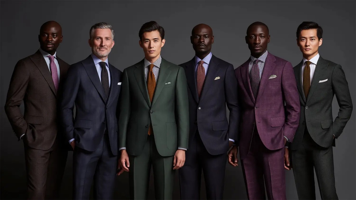 Formal suits in charcoal, midnight blue, deep green and plum with silk ties